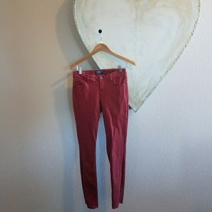 Dusty faded red rockstar skinny jeans